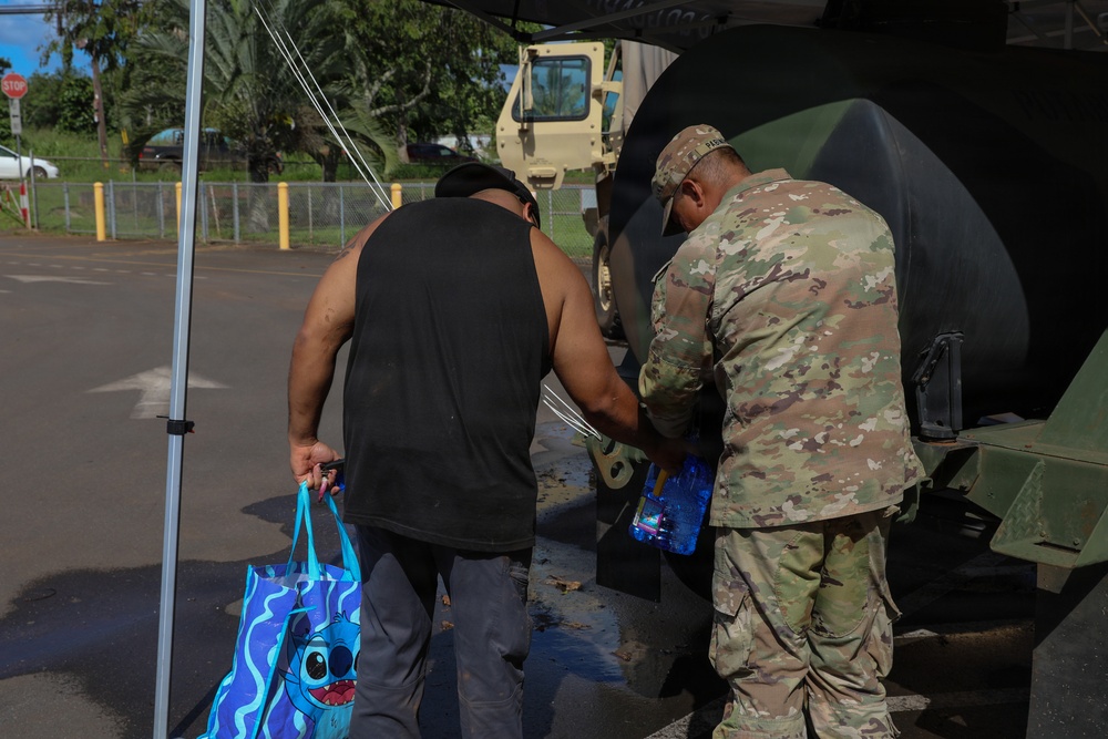 After the flood, help arrives by the truckload — Oahu · March–April 2026