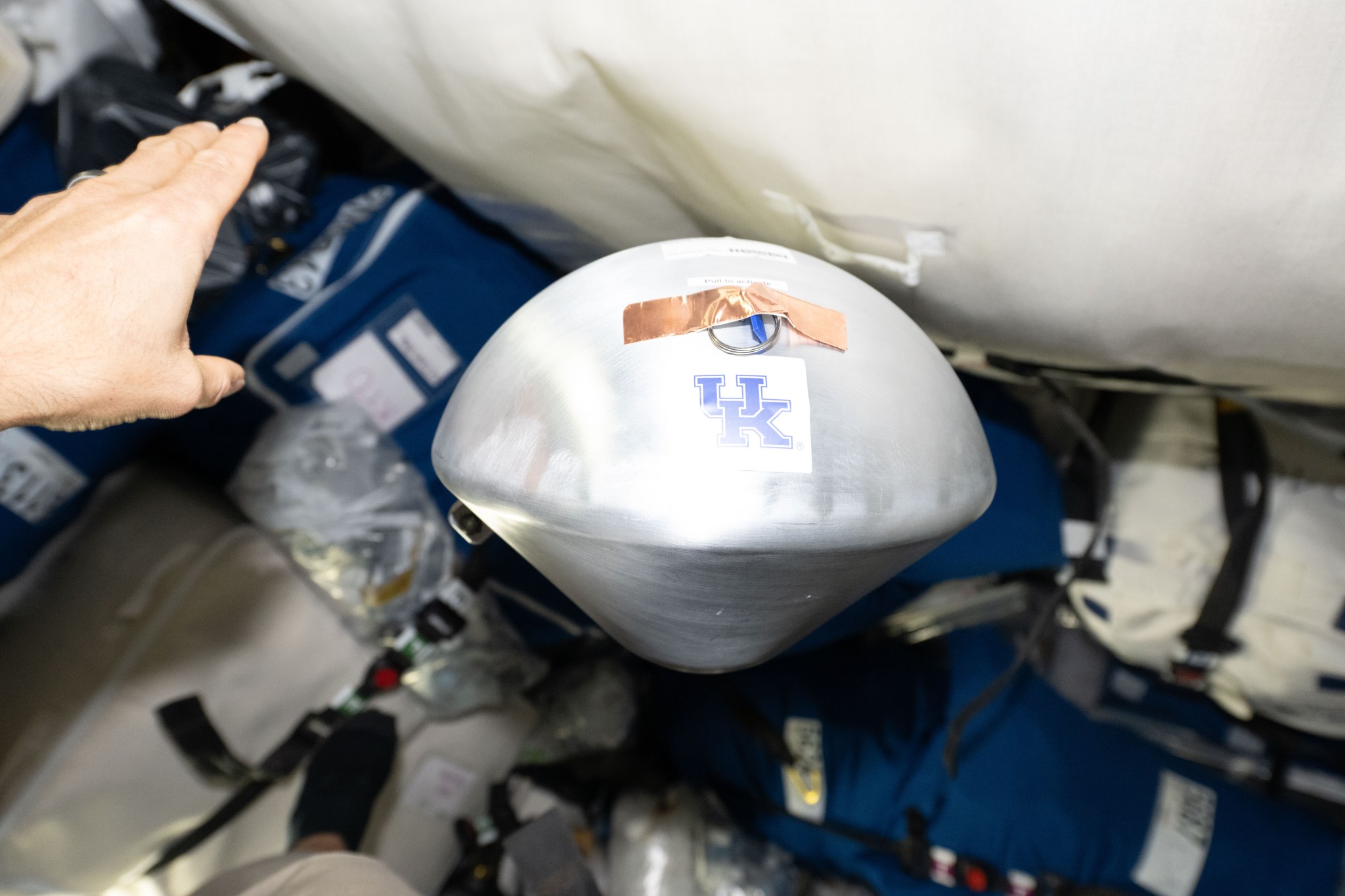 An actual KREPE-3 experimental capsule floats inside the Cygnus cargo spacecraft on October 7, 2026.