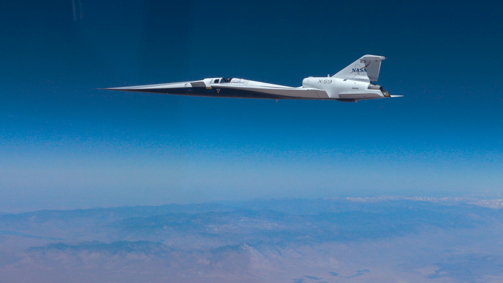 NASA’s X-59 research aircraft flying above clouds during its June 5, 2026 supersonic flight.